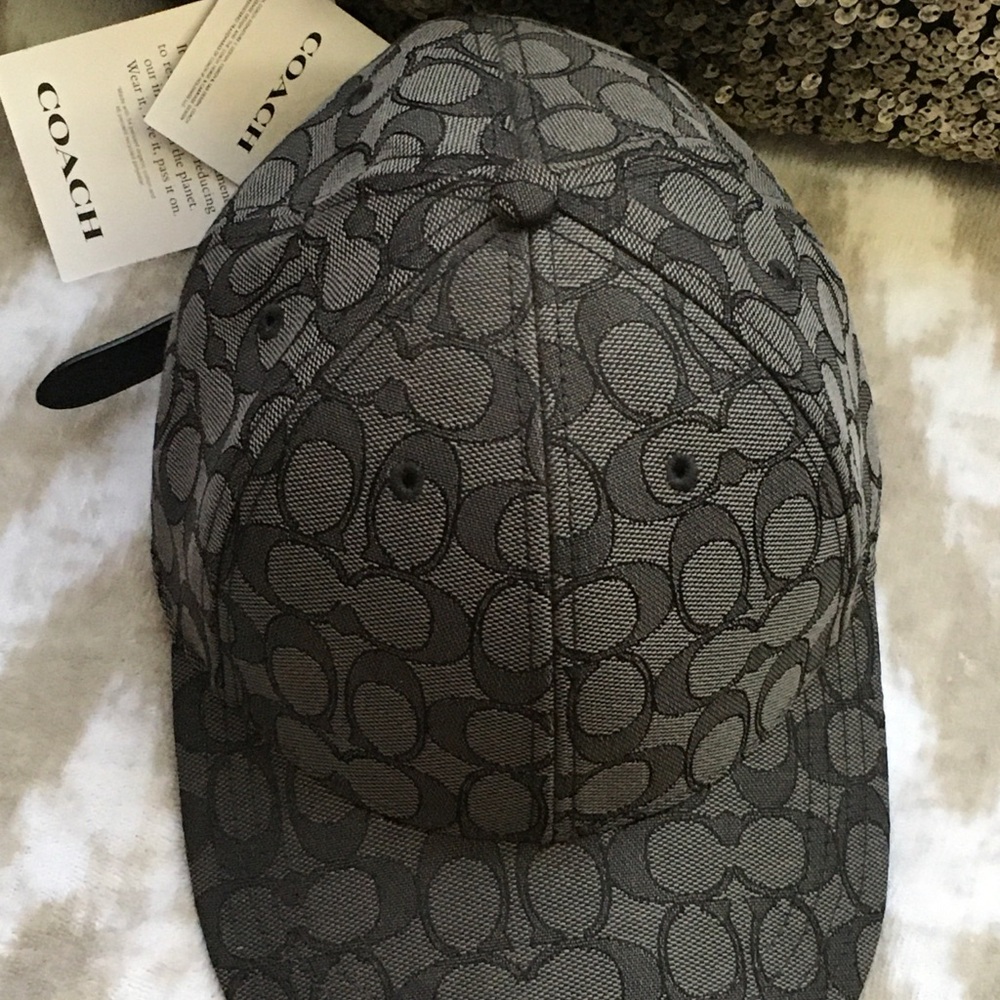 Coach graphite/black logo baseball cap. New with tags. Never worn. Authentic.